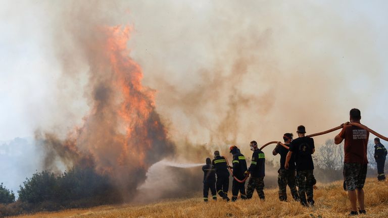 Firefighters battled 154 wildfires on Friday, with 64 burning into the night