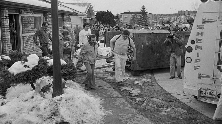 Police search the home of John Wayne Gacy. Pic: AP