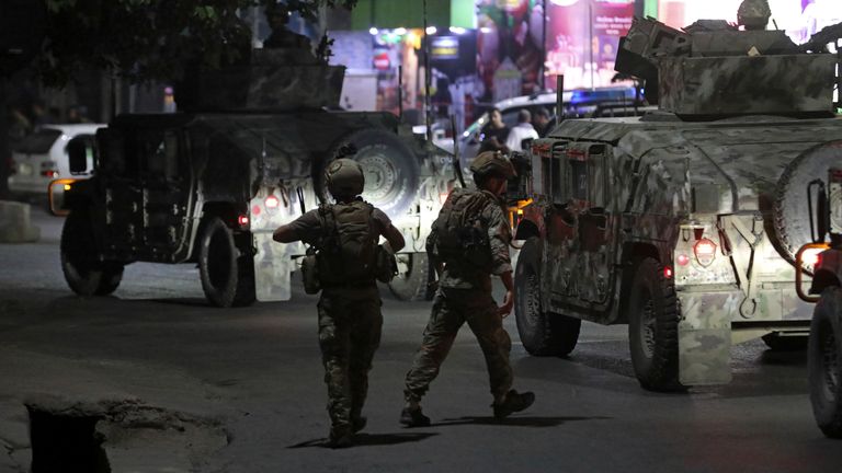 Afghan security personnel arrives at the site of a powerful explosion in Kabul, Afghanistan, Tuesday, Aug. 3, 2021. The explosion rocked a posh neighborhood of the Afghan capital where several senior government officials live. (AP Photo/Rahmat Gul)