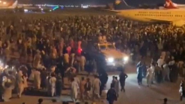Crowds gather at Kabul Airport amid evacuation