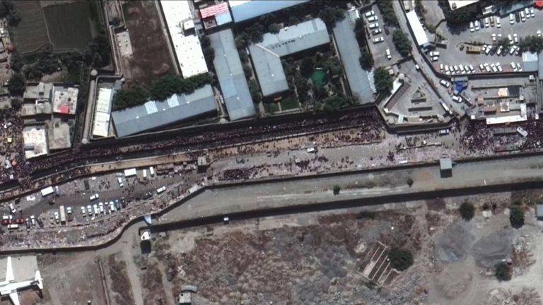 Crowds gather outside the airport in Kabul. Pic:: Maxar Technologies