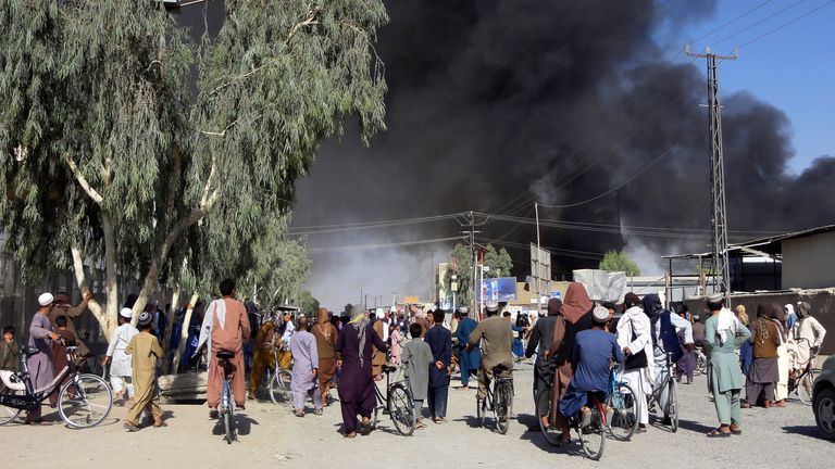 Smoke rises after fighting between the Taliban and Afghan security personnel in Kandahar, southwest of Kabul, on Thursday. Pic: AP
