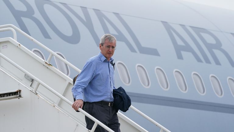 Britain&#39;s ambassador to Afghanistan, Sir Laurie Bristow, leaves the plane at RAF Brize Norton