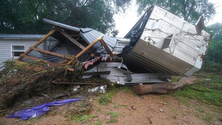 Some of the damage to property caused by Saturday&#39;s flooding in McEwen, Tennessee. Pic: AP