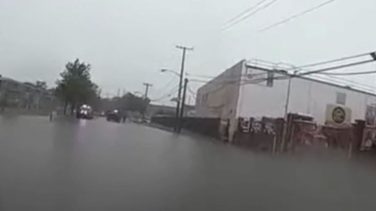 Motorist cut off by flood in New Jersey
