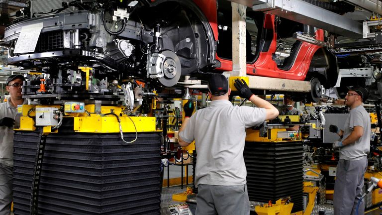 Workers are seen on the production line at Nissan&#39;s car plant in Sunderland, Britain, October 10, 2019.