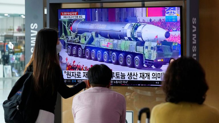 People watch a nuclear missile being paraded through North Korea on TV in Seoul.Pic: AP