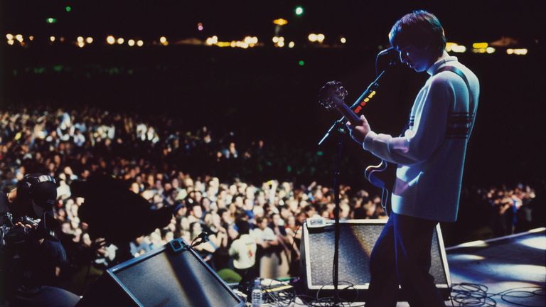 Noel Gallagher of Oasis playing at Knebworth in 1996. Pic: Jill Furmanovsky