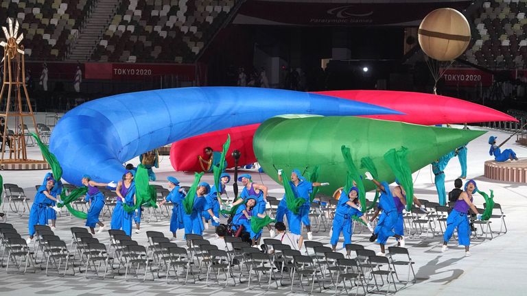 Mostly spectator-free opening ceremony kicks off pandemic-delayed Tokyo 2020