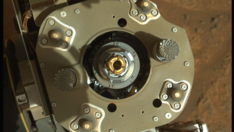 This enhanced-color image from the Mastcam-Z instrument aboard NASA’s Perseverance rover shows sample tube inside the coring bit after the Aug. 6 coring activity was completed. Credits: NASA/JPL-Caltech.