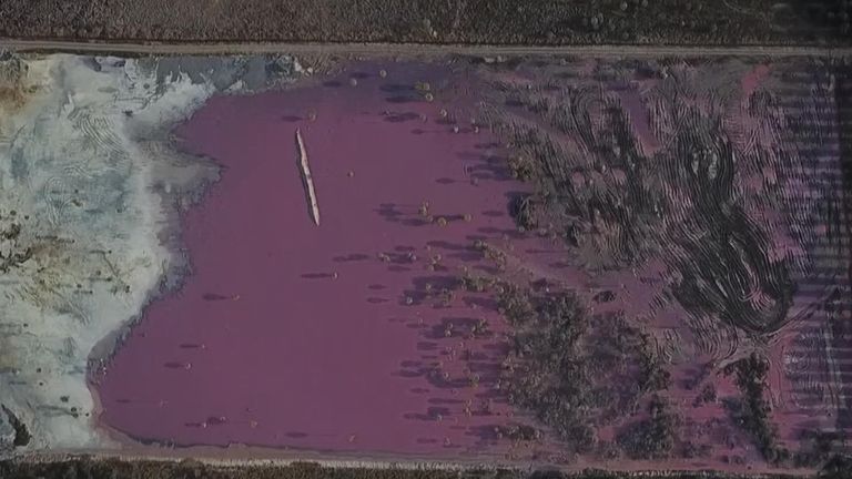 Pollution turns lake pink