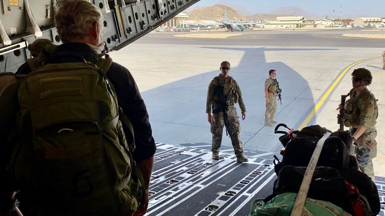 Stuart Ramsay at the ramp of the C-17 as it prepares to leave Afghanistan