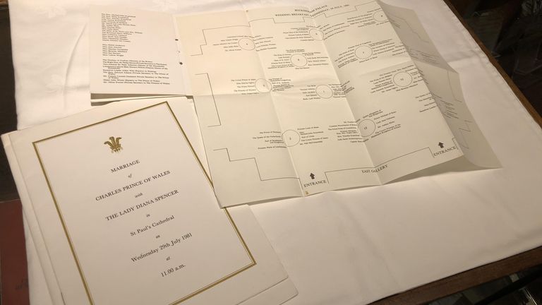 The order of service, ceremonial details and a royal wedding breakfast programme which along with a slice of cake has fetched £1,850 at auction