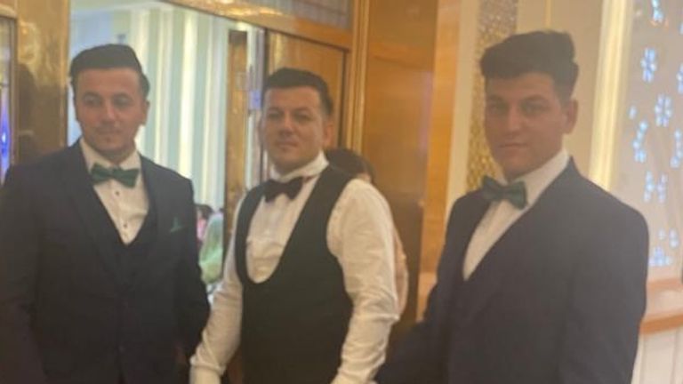 Sabrallah Zahiri with his brothers Abdul Wajed and Fatur Raman at a wedding on 8 August