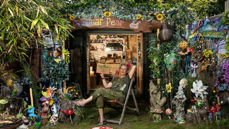 Embargoed to 2000 Friday August 06 Undated handout photo issued by Cuprinol of Ally Scott with her shed 'The Peculiar Pear' in Southampton, Hampshire which won the Workshop/Studio Category in Cuprinol's shed of the year competition. Issue date: Friday August 6, 2021.