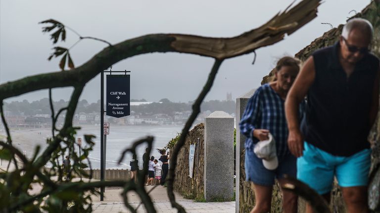 Fallen tree branches obstructed roads as Storm Henri brought strong winds and heavy rain. Pic: Associated Press