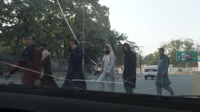 Taliban members have been seen walking through Kabul after the Islamist movement captured the Afghan capital