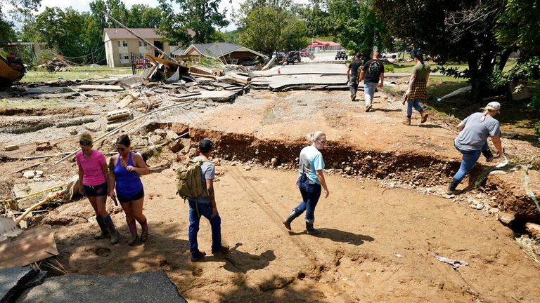 People in Waverly in mid-Tennessee assess the damage after the heavy rainfall caused devastating floods. Pic: AP