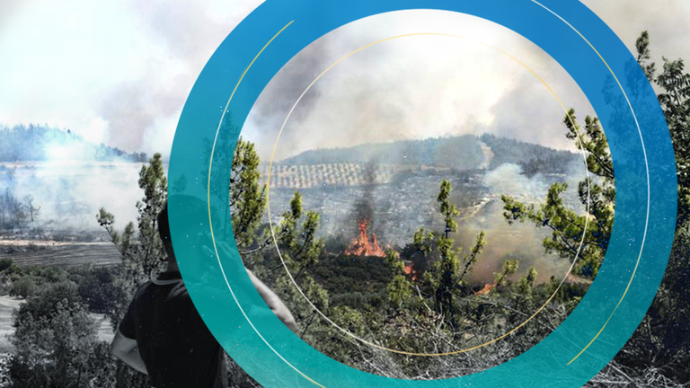 A man watches wildfires in Kacarlar village near the Mediterranean coastal town of Manavgat, Antalya, Turkey, Saturday, July 31, 2021. The death toll from wildfires raging in Turkey&#39;s Mediterranean towns rose to six Saturday after two forest workers were killed, the country&#39;s health minister said. Fires across Turkey since Wednesday burned down forests, encroaching on villages and tourist destinations and forcing people to evacuate. (AP Photo)