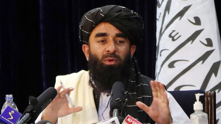 Taliban spokesman Zabihullah Mujahid speaks during a news conference in Kabul
