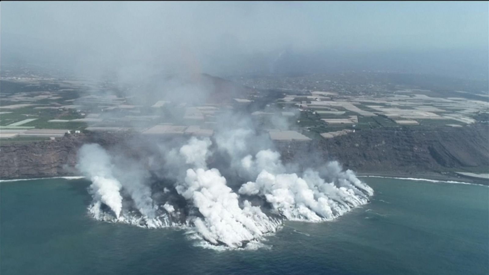 La Palma volcano: Drone shows lava flowing into the Atlantic ocean ...