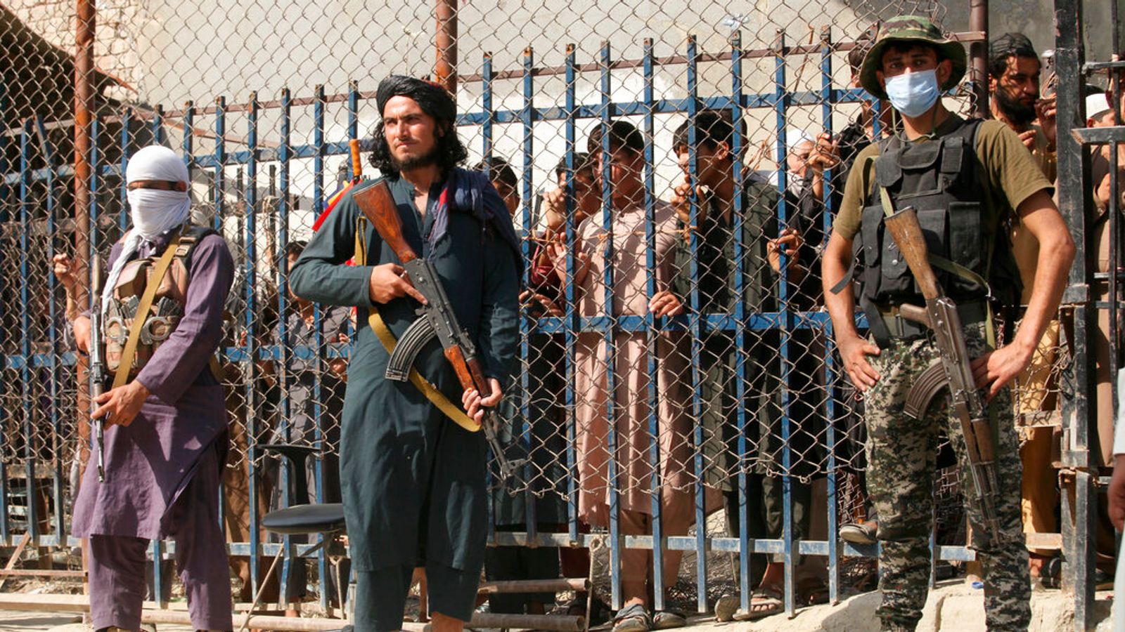 Afghanistan Taliban fighters armed with knuckle dusters and whips