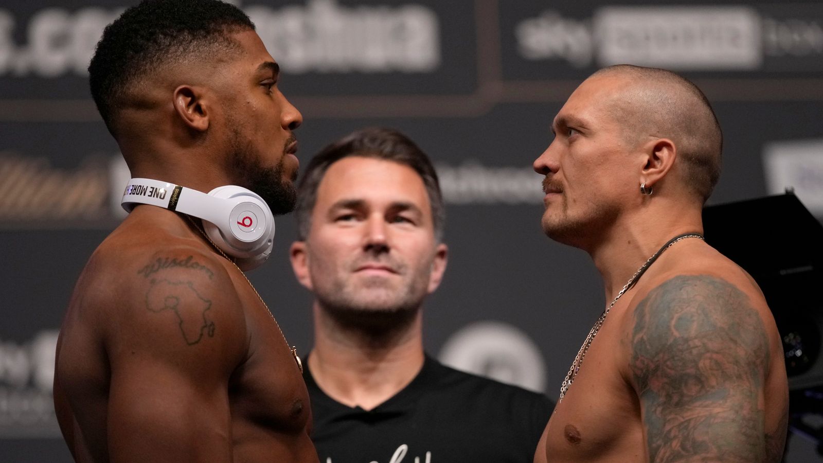 Anthony Joshua and Oleksandr Usyk Tense stare-down at weigh-in before world heavyweight title fight UK News Sky News