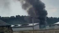 Firefighters are tackling a huge fire which has broken out on an industrial estate in Dewsbury, West Yorkshire.