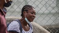 A Haitian migrant who was flown out of Texas by the US arrives in Port-au-Prince, Haiti