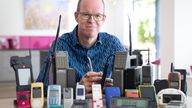 The Mobile Phone Museum founder Ben Wood with some of the over 2,000 unique mobile phones that will be part of the online museum when it launches in November