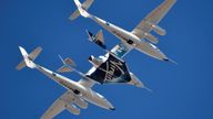 FILE PHOTO: Virgin Galactic rocket plane, the WhiteKnightTwo carrier airplane, with SpaceShipTwo passenger craft takes off from Mojave Air and Space Port in Mojave, California, U.S., February 22, 2019. REUTERS/Gene Blevins/File Photo
