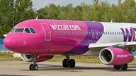 24 August 2020, Brandenburg, Sch&#39;nefeld: A passenger plane of the Hungarian low-cost airline Wizz Air Hungary Ltd. is parked at Berlin-Sch&#39;nefeld Airport. Photo by: Patrick Pleul/picture-alliance/dpa/AP Images