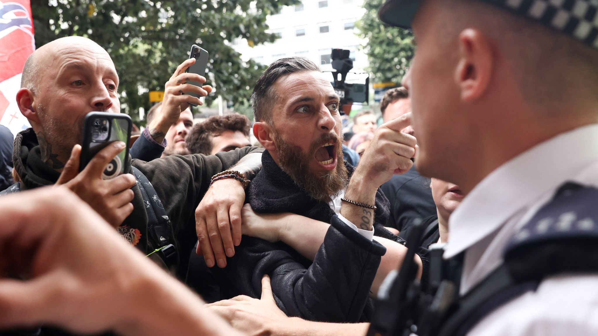 COVID-19: Four police officers injured after violence breaks out at anti-vaccine protest in London | UK News | Sky News