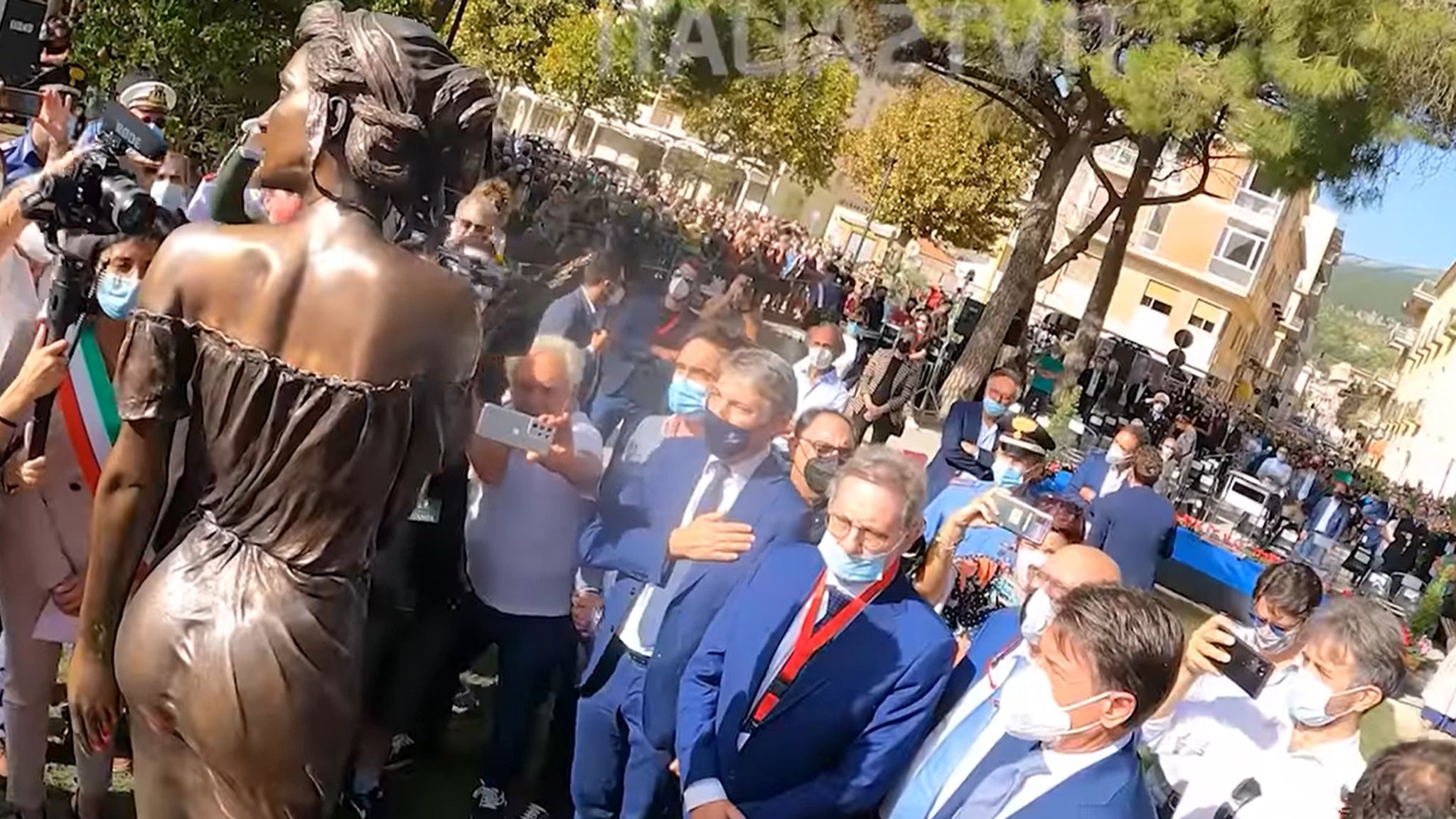Bronze statue of woman in seethrough dress sparks sexism row in Italy