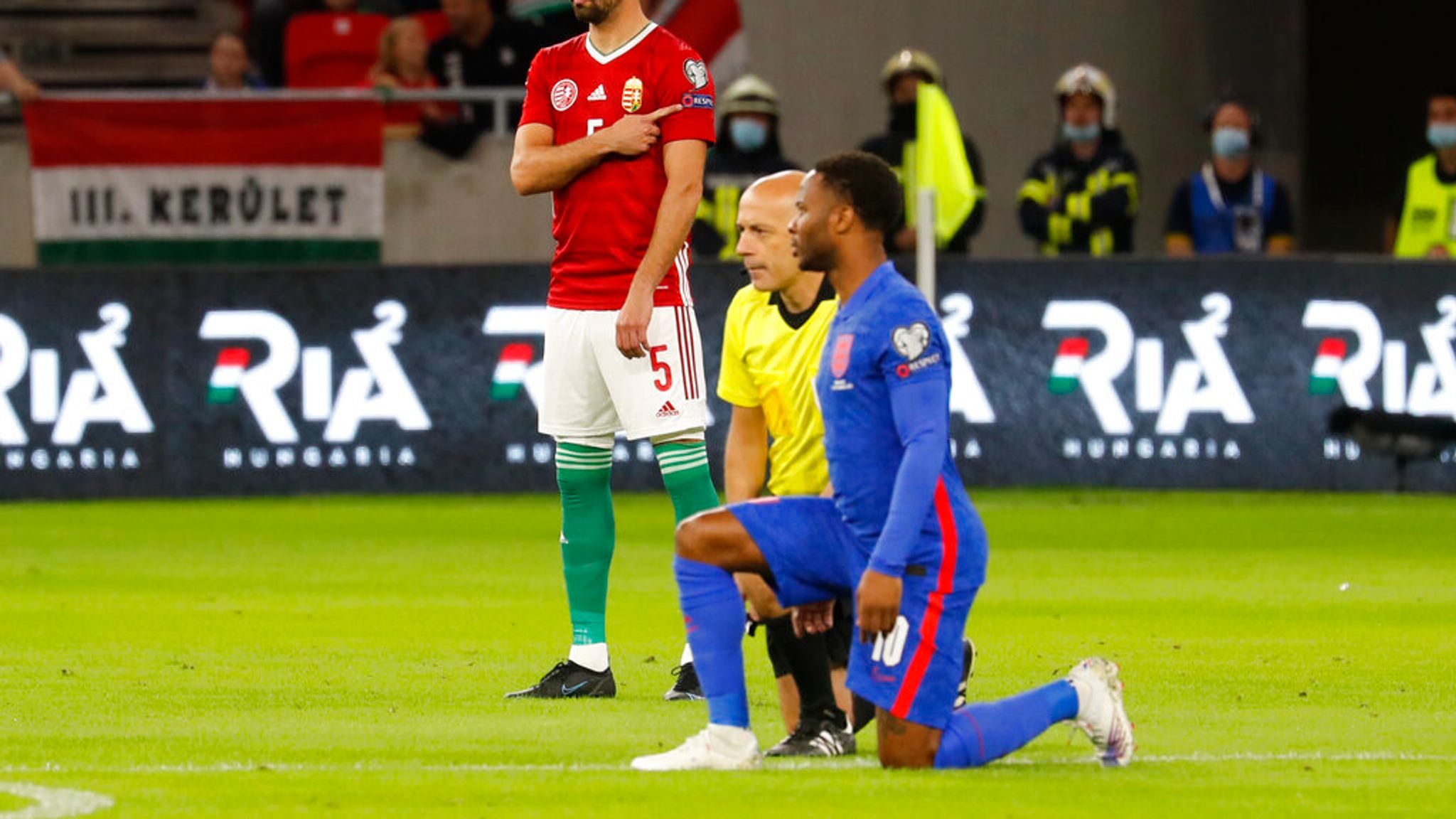 English Players on Knees.