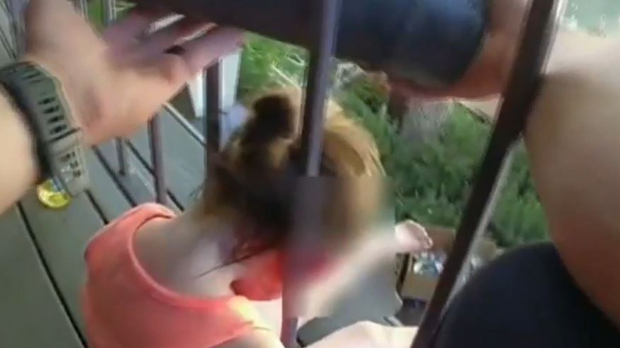 Police in Colorado manage to bend the metal bars enough for the small girl  to wriggle out.