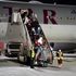 Dual-nationality Afghans touching down in Doha feel safe but angry at West