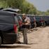 Vehicles form barrier at Texas border to deter migrants - as VP Harris criticises 'horrible' tactics