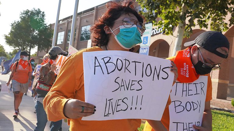 Abortion rights supporters gather to protest Texas SB 8 in front of Edinburg City Hall on Wednesday, Sept. 1, 2021, in Edinburg, Texas. The nation's most far-reaching curb on abortions since they were legalized a half-century ago took effect Wednesday in Texas, with the Supreme Court silent on an emergency appeal to put the law on hold.(Joel Martinez/The Monitor via AP)