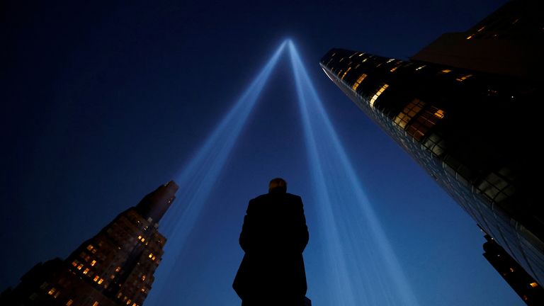 The lights hauntingly mark where the towers once stood