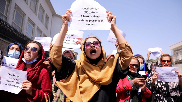 Afghan women&#39;s rights defenders and civil activists protest to call on the Taliban for the preservation of their achievements and education, in front of the presidential palace in Kabul