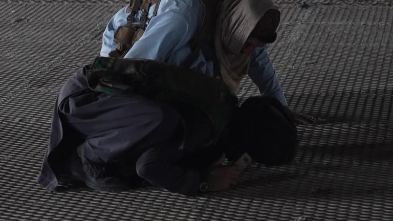 Some of the Taliban militants drop to their knees to pray