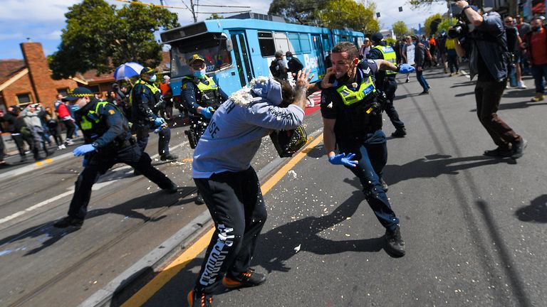 Victoria police clash with protesters during a Rally for Freedom in Melbourne, Australia. Pic: AP                                                        