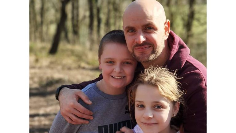 Jason Bennett and his children John and Lacey. John and Lacey were among four people found dead at a house on Chandos Crescent, Killamarsh