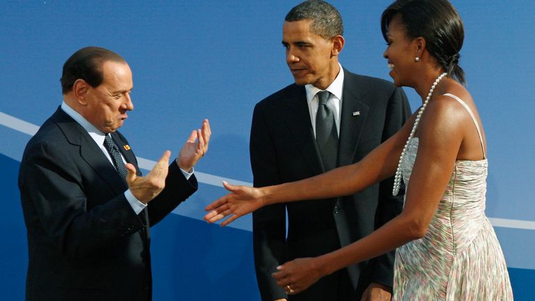 Silvio Berlusconi with Barak and Michelle Obama during a G20 summit in 2009