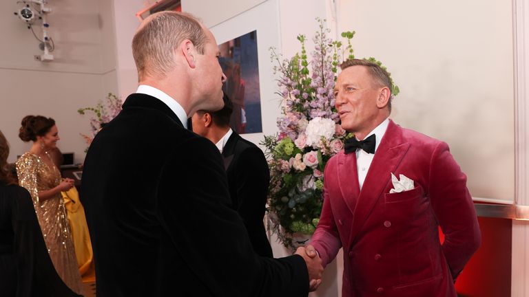 The Duke of Cambridge meets Daniel Craig upon his arrival for the World Premiere of No Time To Die, at the Royal Albert Hall in London. Picture date: Tuesday September 28, 2021.