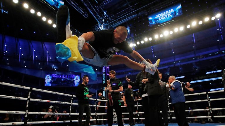 Usyk celebrates winning his fight