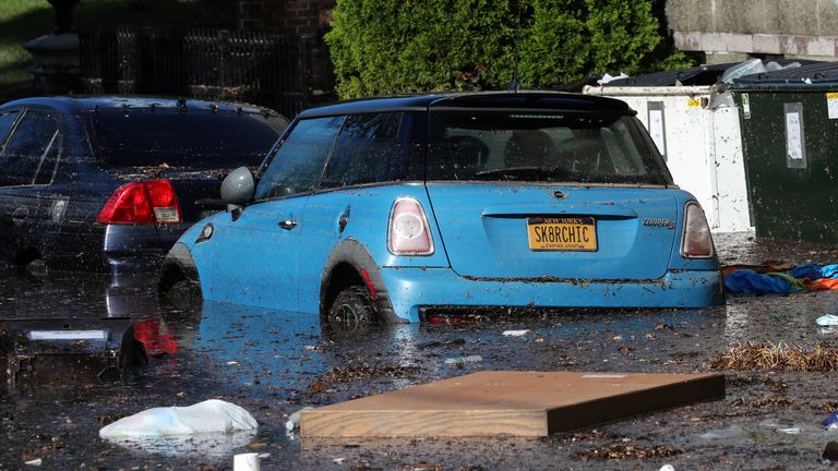 Local residents escape flooding in Mamaroneck, New York
