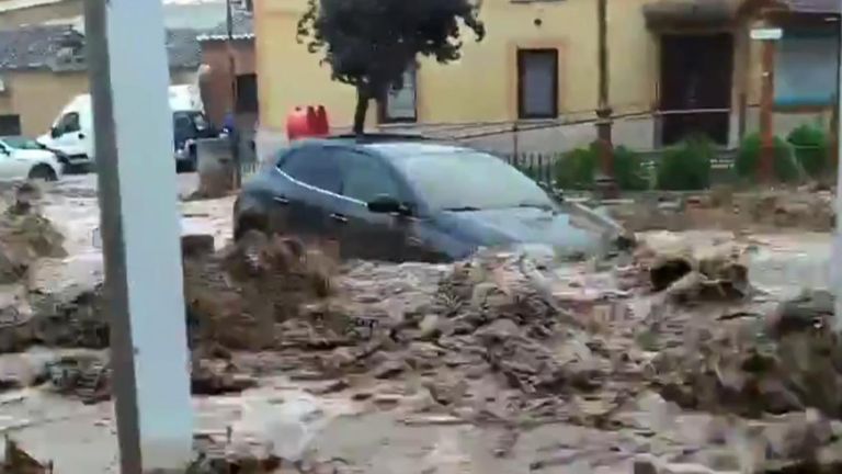 Car Swept Down Street in Toledo, Spain, as Flash Flooding Hits Region