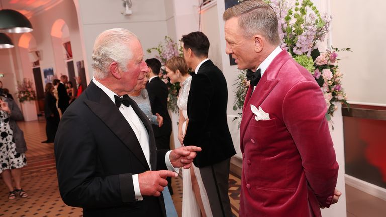 The Prince of Wales speaks with Daniel Craig upon his arrival for the World Premiere of No Time To Die, at the Royal Albert Hall in London. Picture date: Tuesday September 28, 2021.